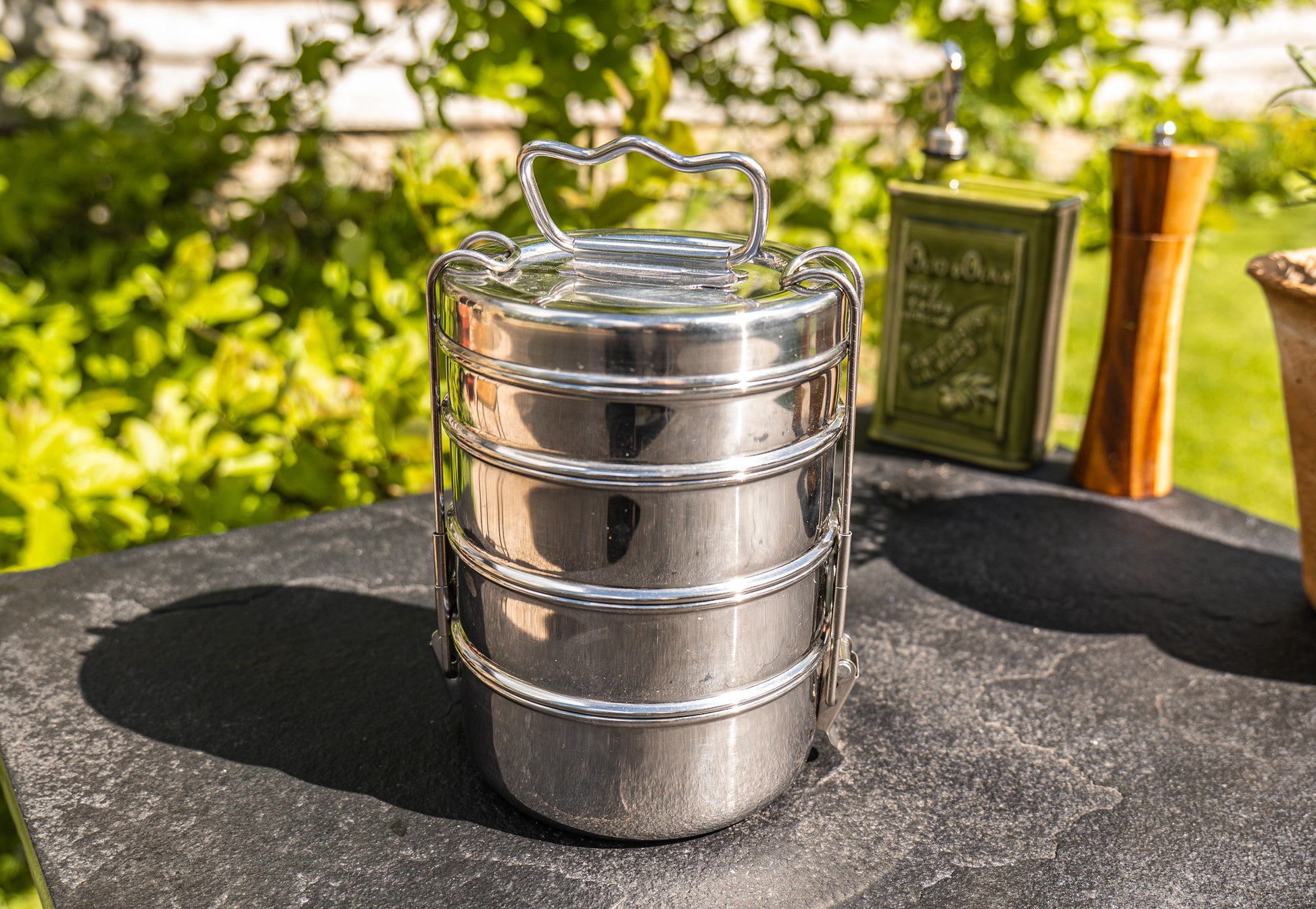 Stack of metal tiffin tin containers