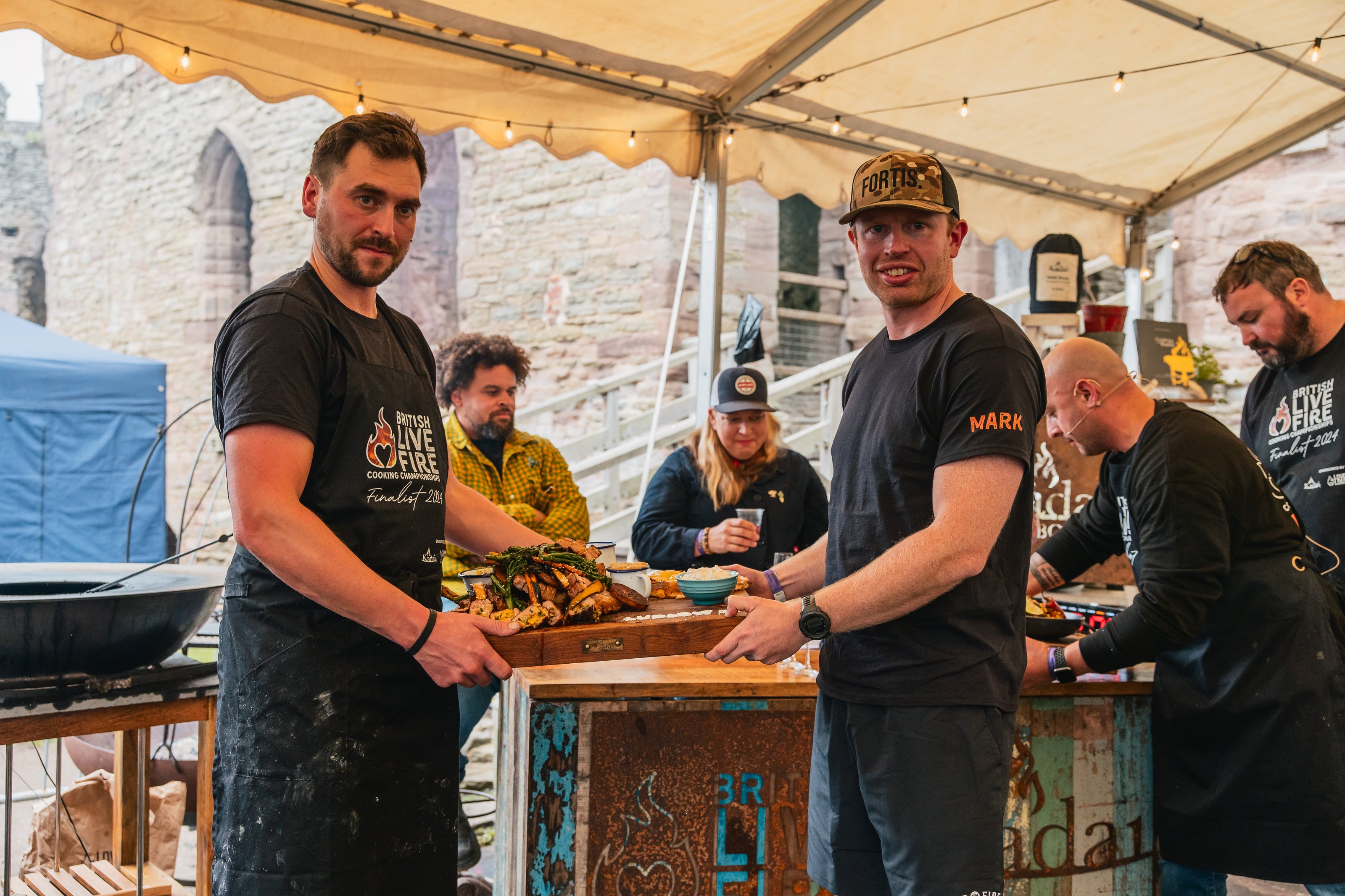 BLFCC contestant showing a chopping covered in delicous food