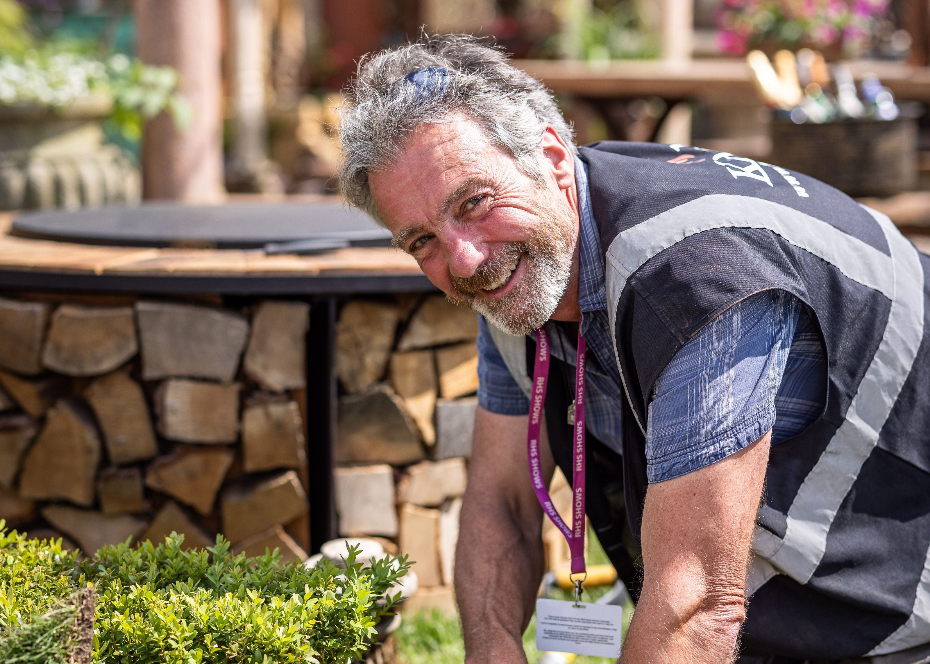 Man working outside in a garden setting