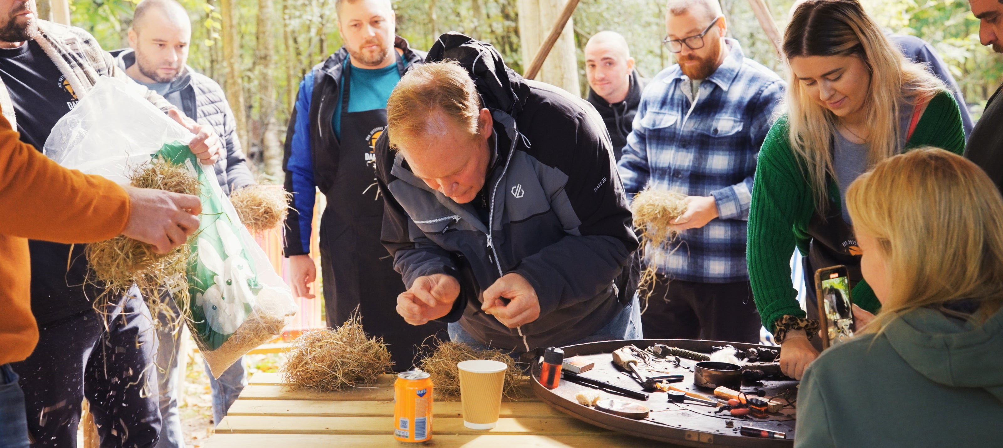 people learning how to make natural firelighters