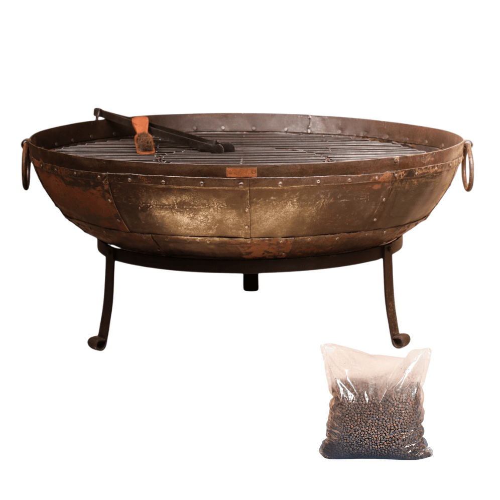 Extra large metal fire pit on a white background.