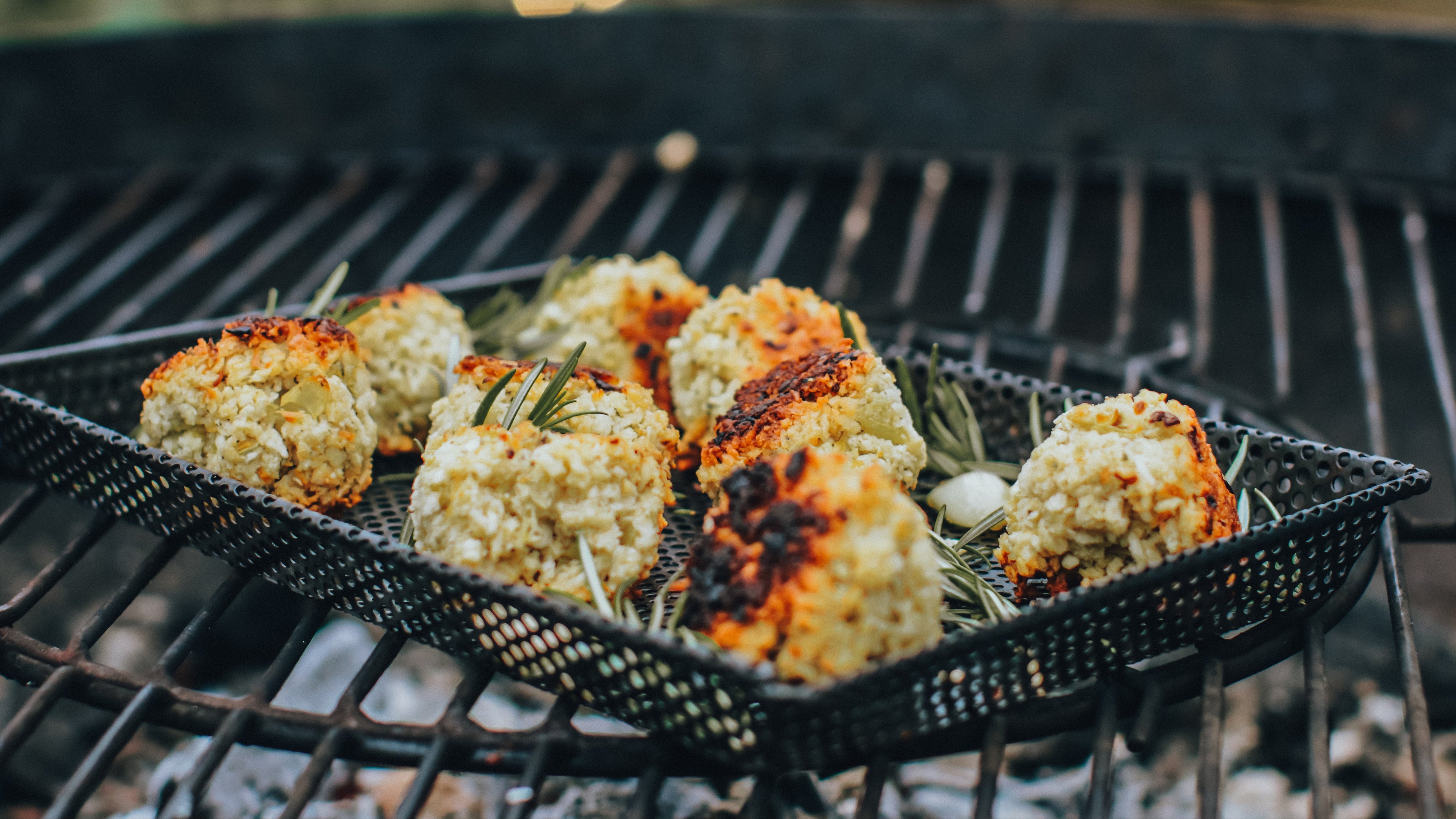 Stuffing balls for a roast dinner on a BBQ grill.
