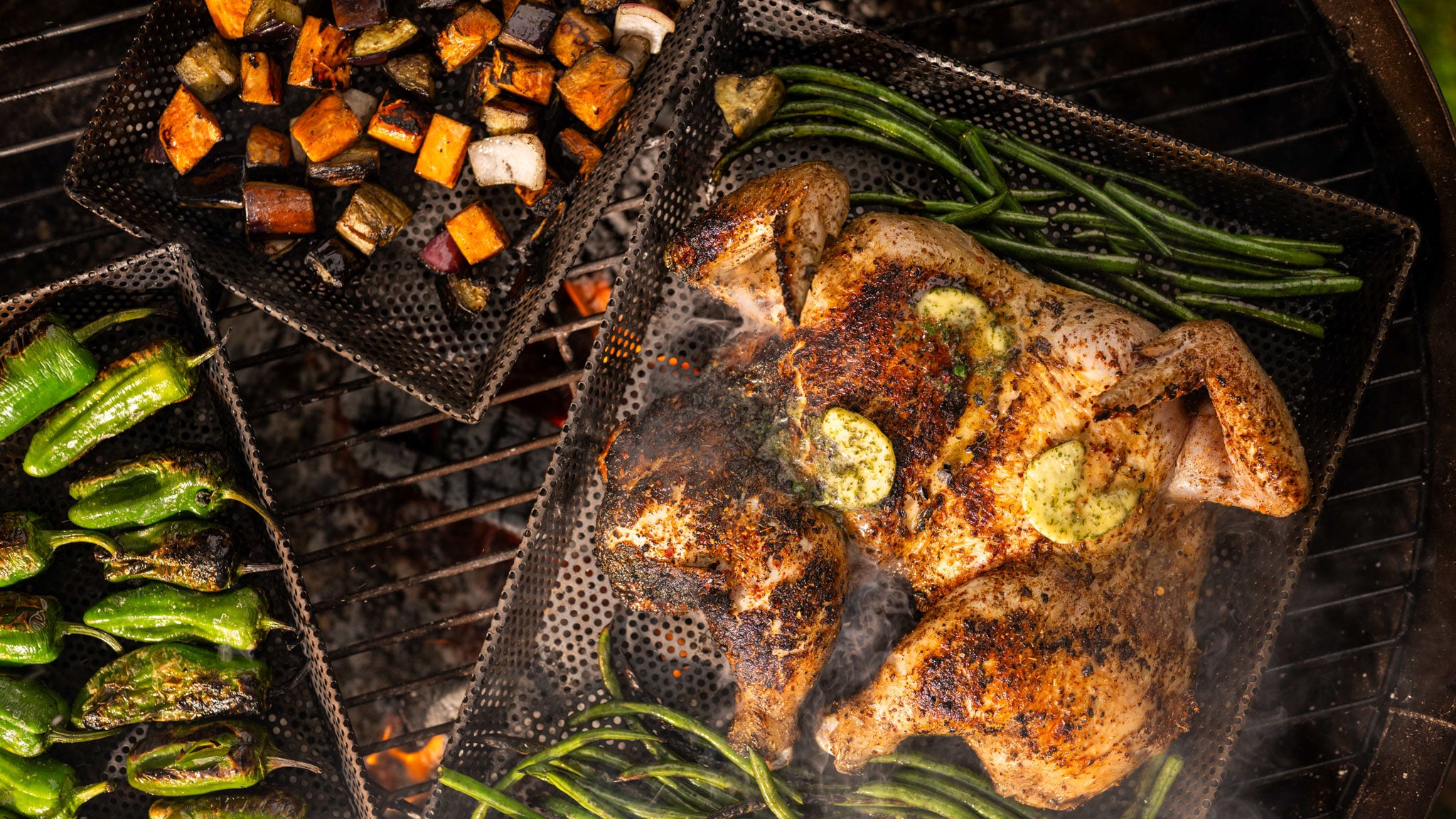 Roasted chicken with vegetables on a kadai grill tray