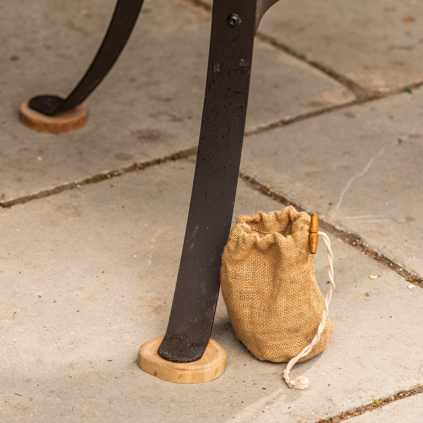 Protective wooden feet for Kadai fire pits, designed to shield patios and decking surfaces from heat while supporting stable outdoor fire bowl placement
