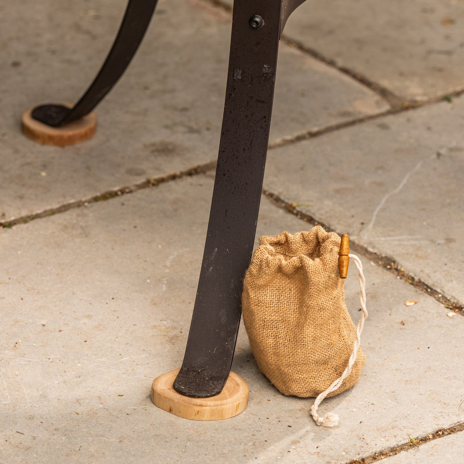 Protective wooden feet for Kadai fire pits, designed to shield patios and decking surfaces from heat while supporting stable outdoor fire bowl placement