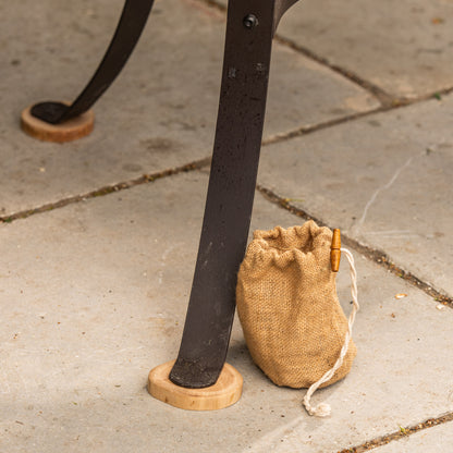 Protective wooden feet for Kadai fire pits, designed to shield patios and decking surfaces from heat while supporting stable outdoor fire bowl placement