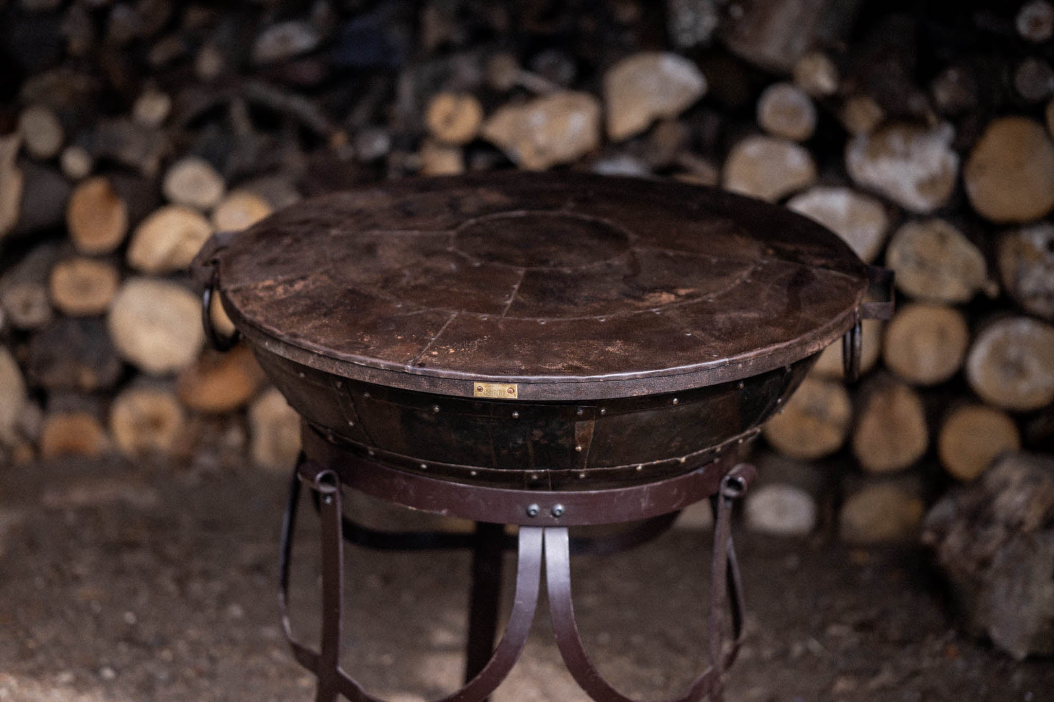 Kadai fire bowl with fitted metal lid.