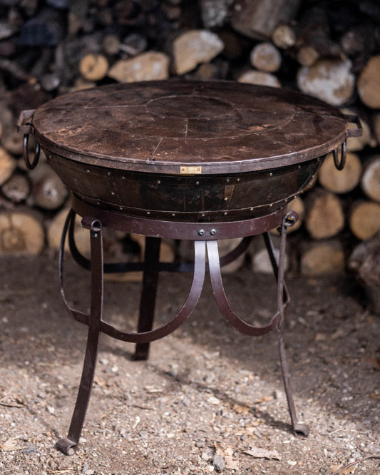 Kadai fire bowl with fitted metal lid.